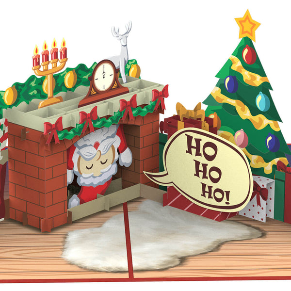 Père Noël dans la carte pop-up de cheminée